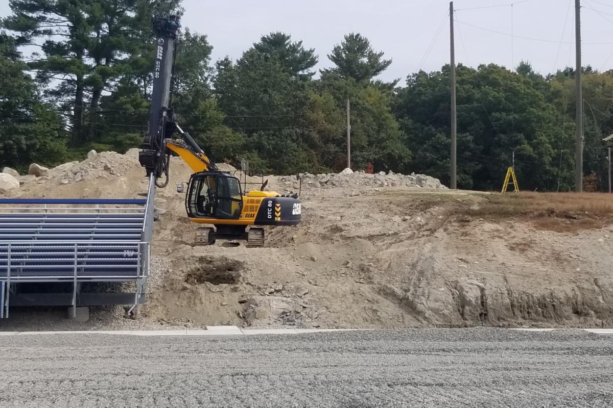 Rig drilling for 20 ft. deep light pole base